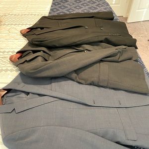 Three lightly used men’s suits. 40 regular with a little alteration.